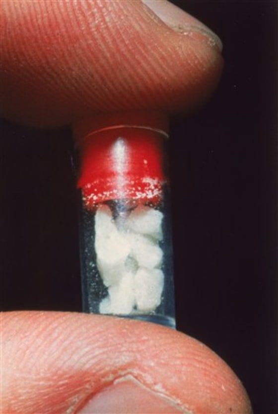 A plastic container of crack, the smokable, purified form of cocaine, is displayed in Boston.